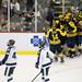 The Michigan team celebrates scoring the fifth goal in the third period of the game against Michigan State at Joe Louis Arena on Saturday, Feb. 2. Daniel Brenner I AnnArbor.com